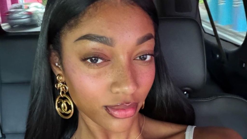 Angel Reese’s Tiny Risqué Bikini Struggles to Contain Her Body in Steamy Pose
