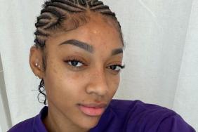 Angel Reese Shows Major Skin in Untied Top That Barely Stays in Place