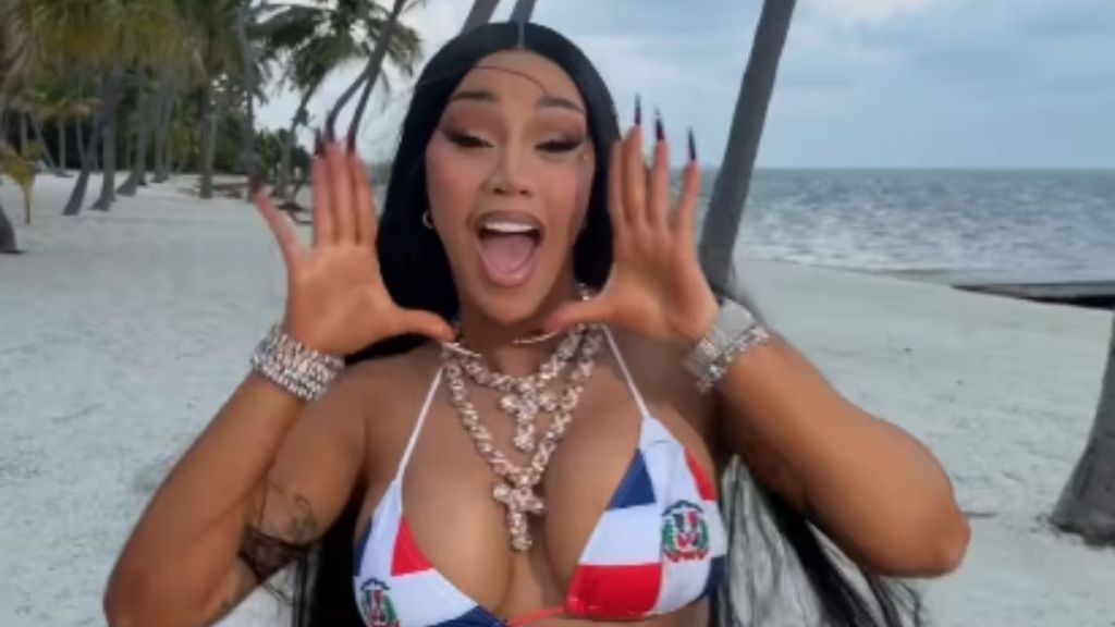 Cardi B Risks It All in a Plunging Skimpy Bikini That Barely Holds Her Curves In