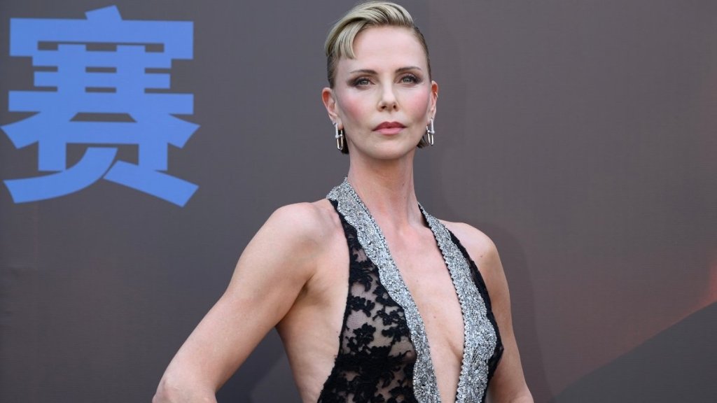 Charlize Theron’s Plunging Givenchy Lace Dress Couldn’t Be More See-Through