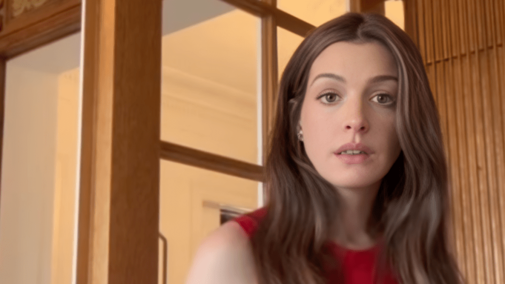 Pregnant Anne Hathaway Wore Her Jumpsuit Backwards & It’s Too Relatable