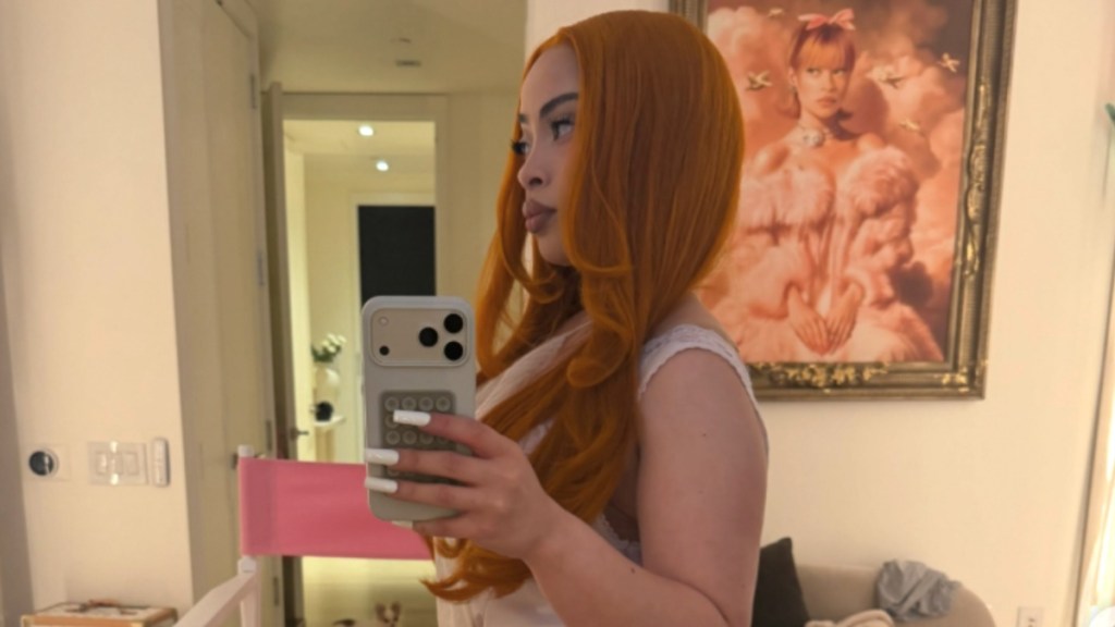 Ice Spice Serves Cheeky Vibes in Lacy Mini Dress With a Waist-High Slit