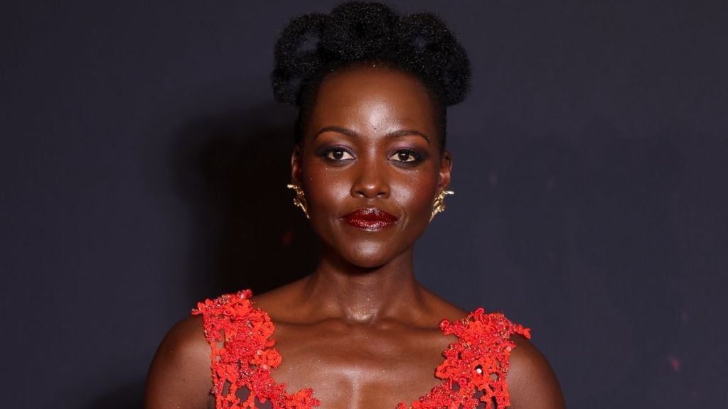 Lupita Nyong’o’s Fully See-Through Dress Has Holes That Graze Her Curves
