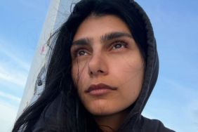 Mia Khalifa Poses in Nothing But an Oversized Sweatshirt That Barely Covers Her Curves