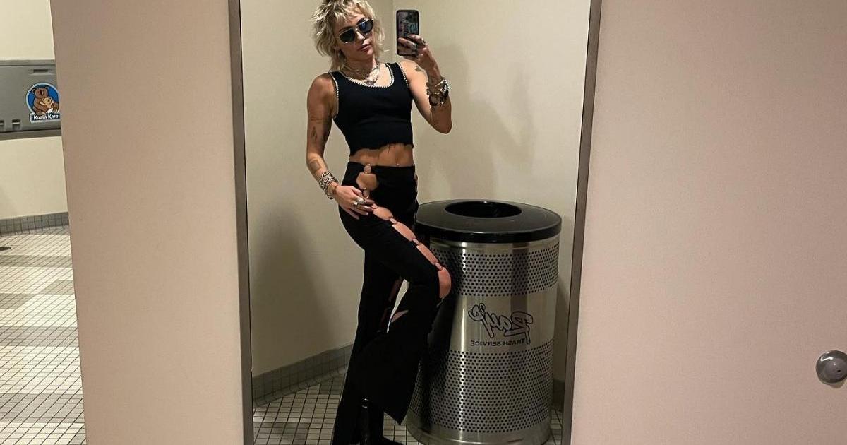 Miley Cyrus Is ‘Gagged’ in a Body-Hugging Corset Dress BTS With Barbie