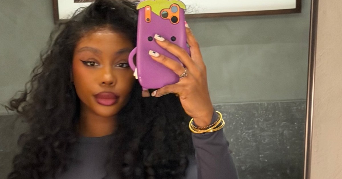 SZA’s Bold Skin-Baring Dress Features a Neckline So Low It Hits Her Waist