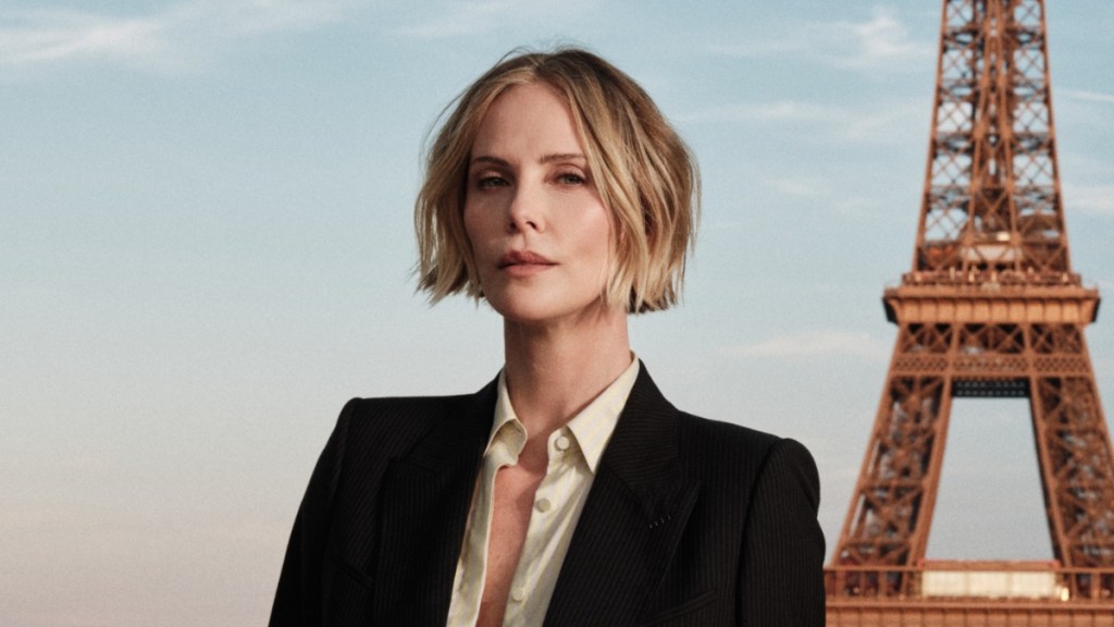 Charlize Theron Leaves Tom Ford Shirt Unbuttoned for Plunging Look