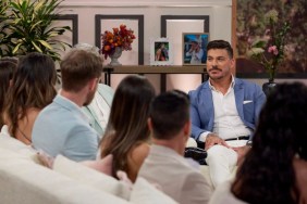 Jax Taylor in a blue suit sitting across from his castmates on The Valley Season 2 reunion