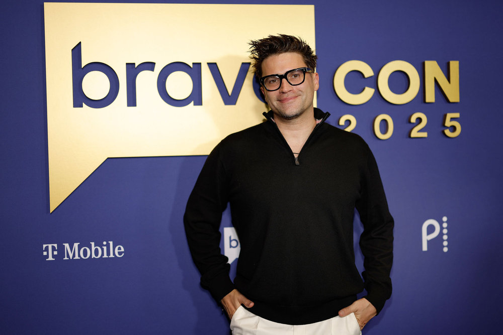 Tom Schwartz arriving at BravoCon 2025 in a black sweater