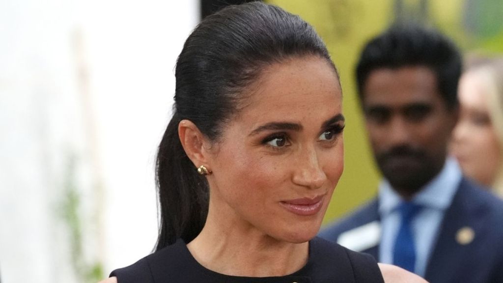 Meghan Markle Pairs Wildly High-Cut Swimsuit With Saucony Sneakers