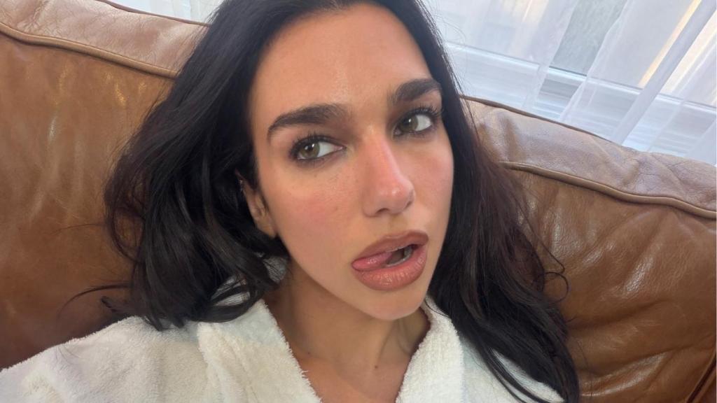 Dua Lipa's Plunging Gucci Lace Cami Top Goes See-Through for SERVICE95