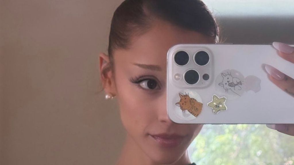 Ariana Grande Delivers a Racy Whip Moment in Lingerie-Inspired Fit
