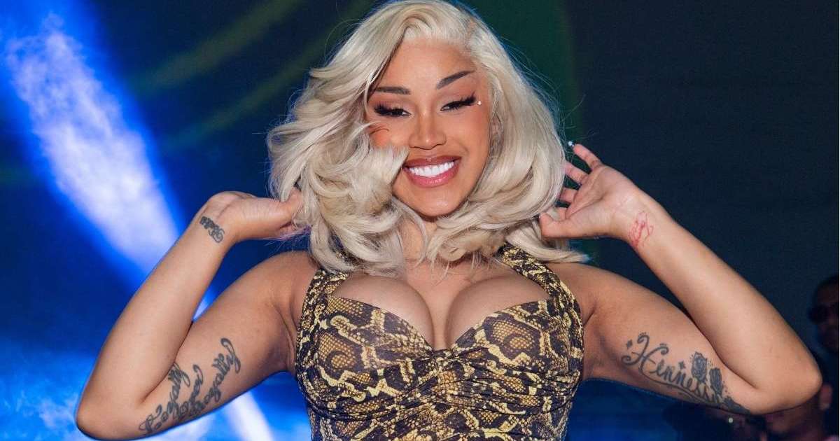 Cardi B Barely Packs Her Curves in Deeply Plunging Gown