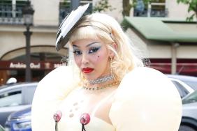 Doja Cat’s Lacy Corset Dress Rides Super High & Plunges Super Low