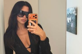 Dua Lipa Leaves Her Cutout Gucci Top Undone for a Deeply Plunging Look