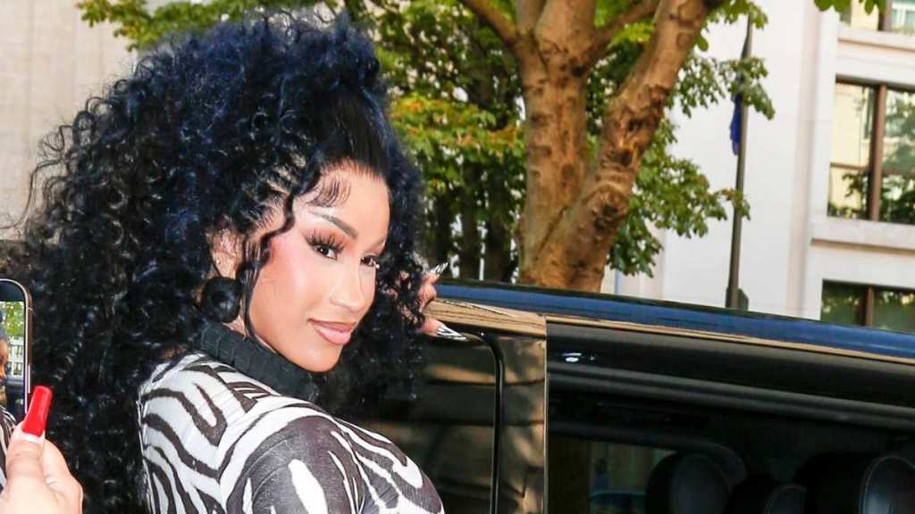 Cardi B’s Plunging Swimsuit Rides Dangerously High, Revealing Her Hip Tattoos