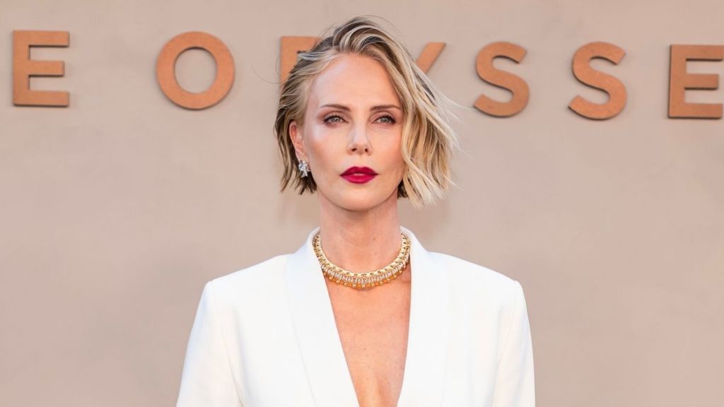 Charlize Theron's Plunging Dior Micro Minidress Rides High on Her Thighs