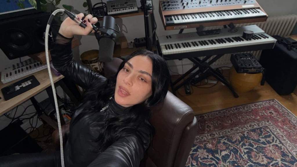 Charli XCX's Isabel Marant Micro Minidress Rides High on Her Thighs