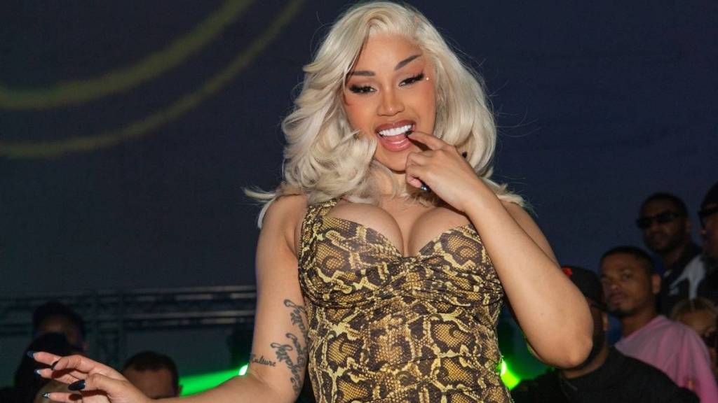 Cardi B Nearly Spills Out of Deeply Plunging Nude Bodysuit