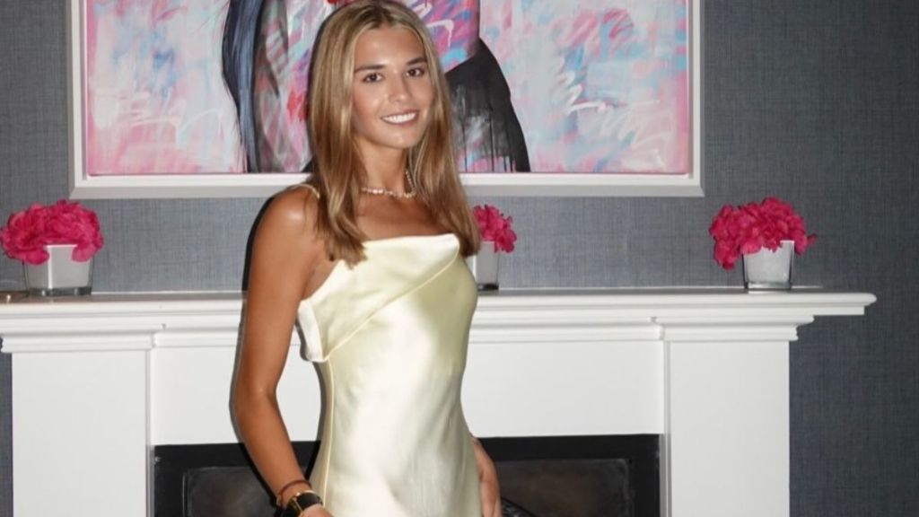 Kai Trump's Slinky Dessy Group Dress Hangs by the Thinnest Strings