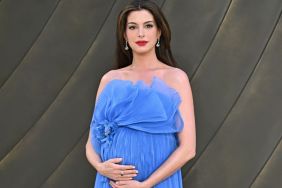 Pregnant Anne Hathaway Cradles Her Baby Bump at ‘The Odyssey’ Premiere