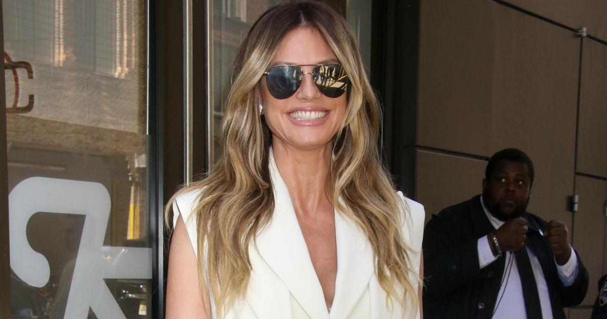 Heidi Klum’s Unbuttoned Shirt Blows Open, Revealing Skimpy Bikini