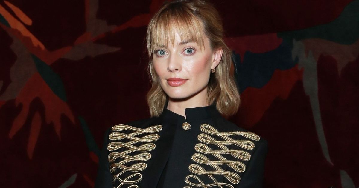 Margot Robbie’s Plunging Urban Outfitters Jumpsuit Hangs…