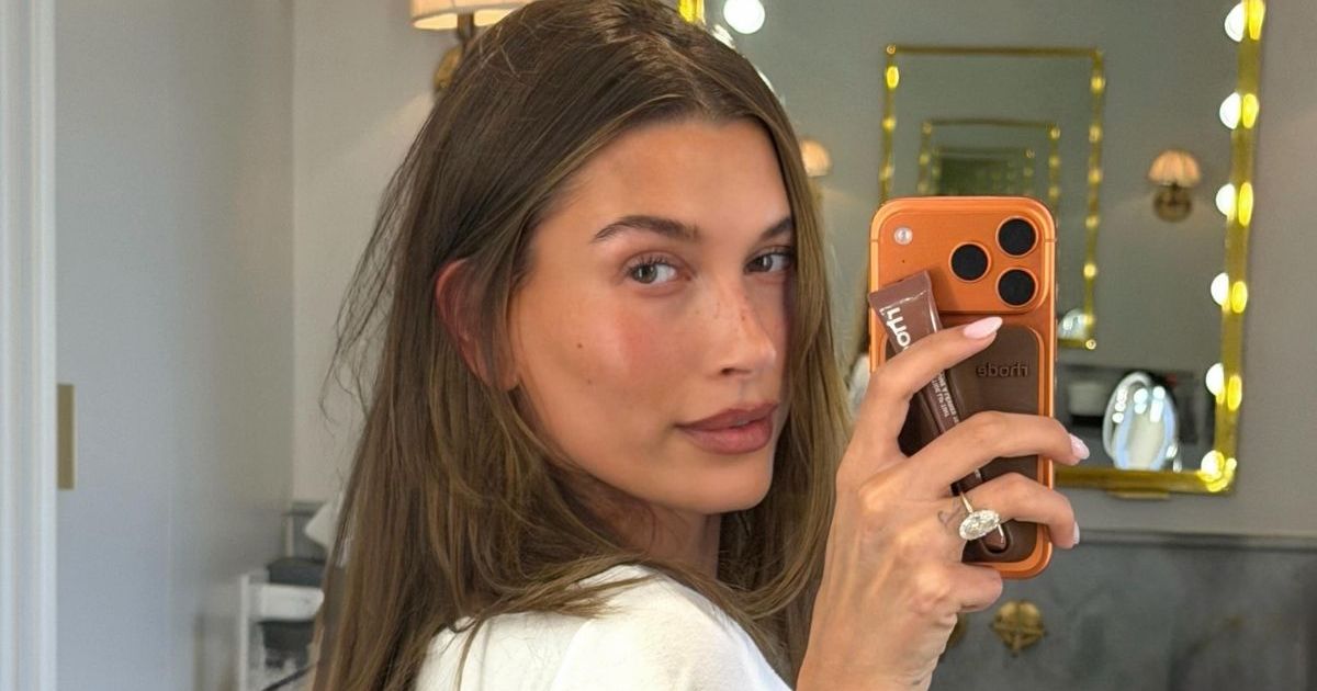 Hailey Bieber’s See-Through D&G Lace Cami Top Hangs by the…