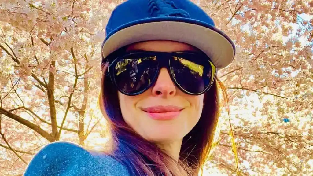 Anne Hathaway Nearly Spills Out of Plunging Bottega Veneta Top for Vogue