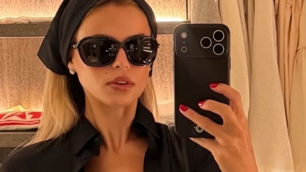 Brooks Nader's Tiny Plunging Alaia Tie-up Top Dips Dangerously Low