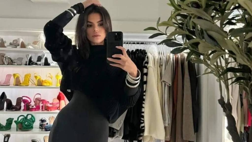 Brooks Nader Wears a Risqué Plunging String Dress Like Only She Can