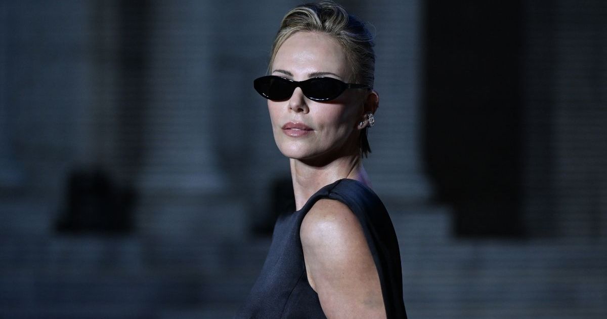 Charlize Theron’s Celine Cutout Gown Dips Ridiculously Low at the Back
