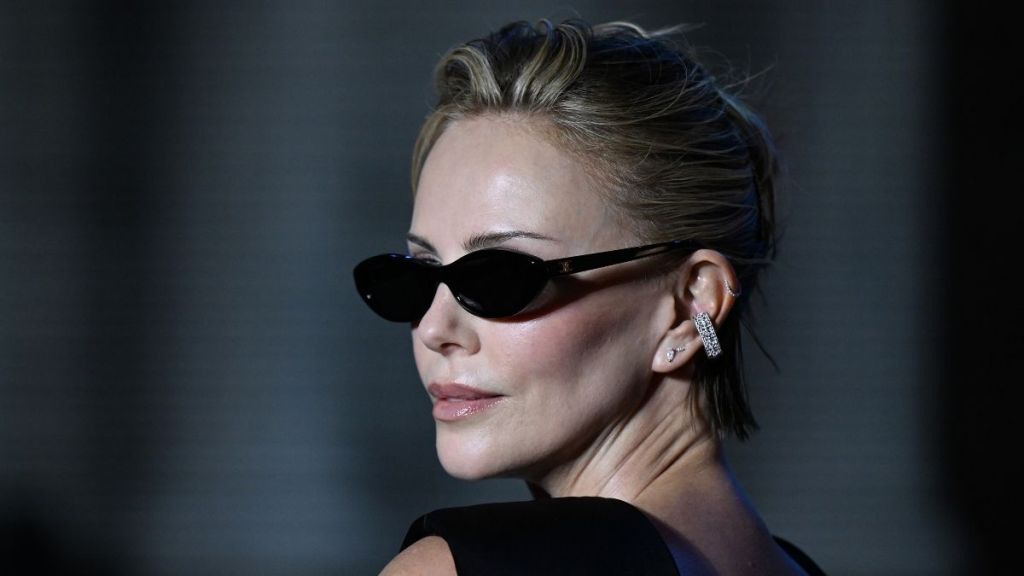 Charlize Theron Elevates Slinky Cutout Dress With Luxe Dior Jewelry