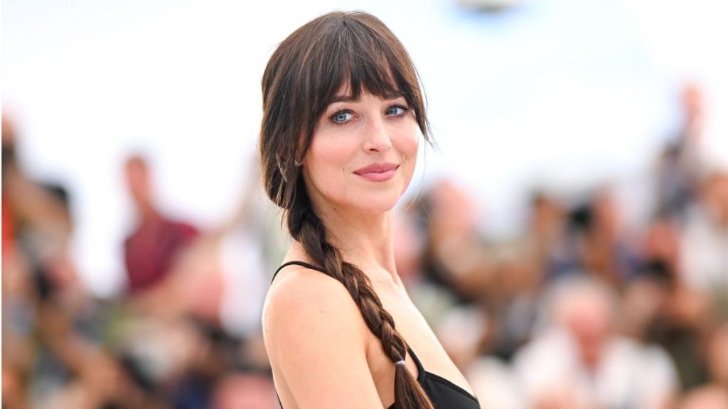 Dakota Johnson’s Red Hot Dress Slips Dangerously Low in Spicy New Ad