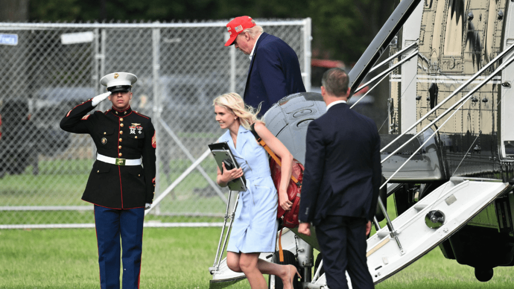 Donald Trump and aide Natalie Harp amid claims that their close relationship created tension with Melania Trump