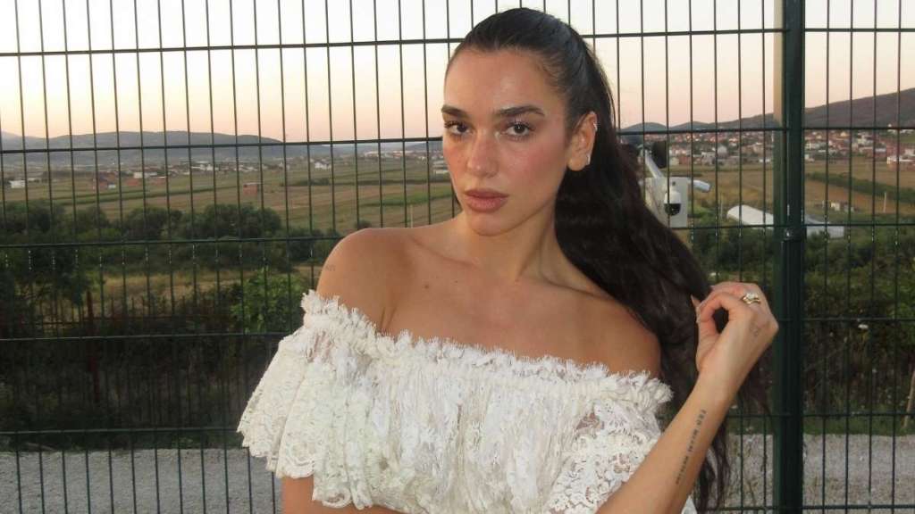Dua Lipa’s Tiny See-Through Lacy Chloe Playsuit Rides High on Her Curves