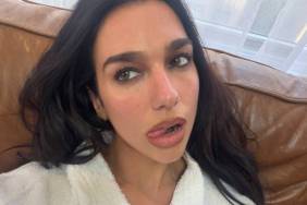 Dua Lipa’s Robe Is Seconds Away From Slipping as She Holds Tight