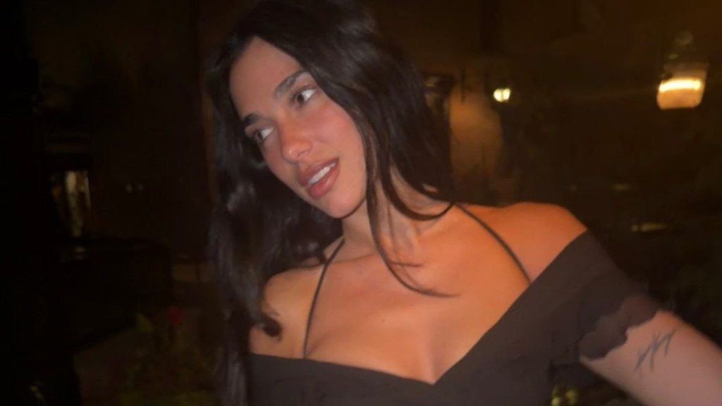 Dua Lipa’s See-Through Dior Micro Minidress Slips off Her Shoulders