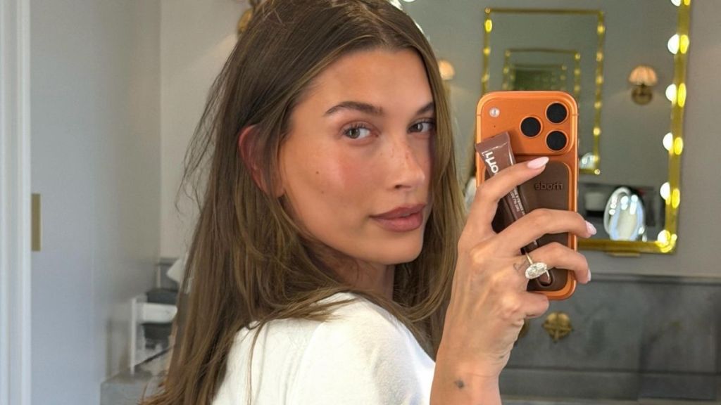 Hailey Bieber's Bright Yellow Camisole Gets Daring With Barely-There Lace Trim