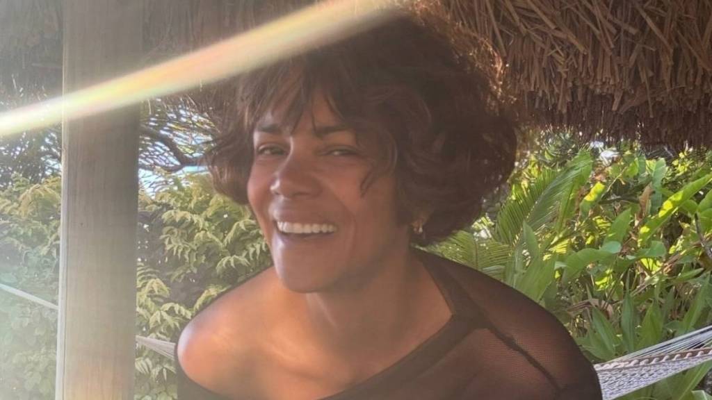 Halle Berry Keeps It Cheeky in Barely-There Plunging Swimsuit