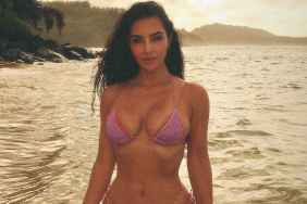 Kim Kardashian Gets Cheeky on the Beach in Fully See-Through Skirt
