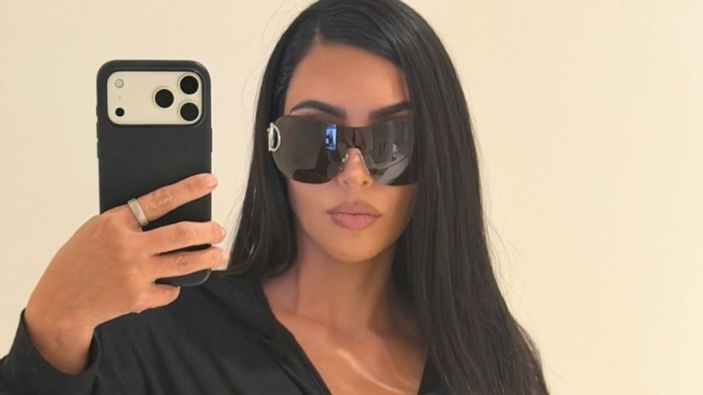 Kim Kardashian Puts Her Curves on Full Display in a Dangerously Plunging Dress