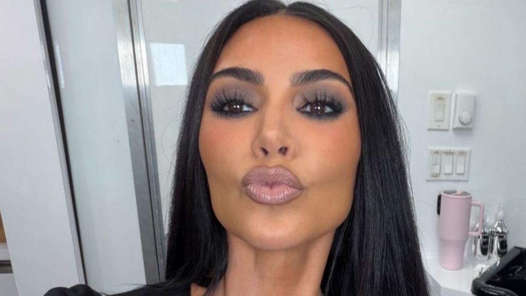 Kim Kardashian's Plunging SKIMS Cardigan Barely Hangs on by a Single Button