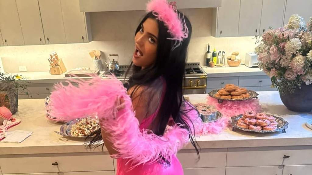 Kylie Jenner's Lacy Lingerie Peeks Through Tiny Saint Laurent Coat