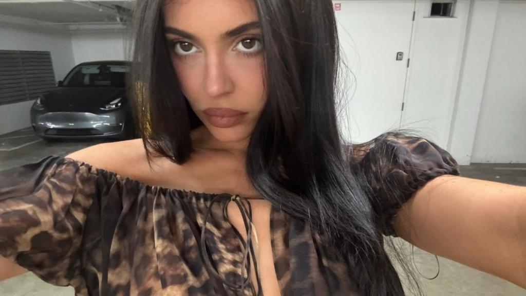 Kylie Jenner Almost Pops Out of Plunging Top While Flaunting Her Bling
