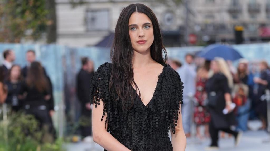 Margaret Qualley Pairs Plunging Dress With Chanel's Wild Barefoot Sandals