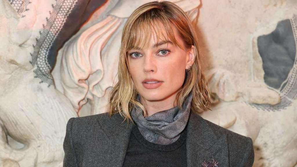 Margot Robbie Elevates Plunging See-Through Top With Chic Chanel Bag