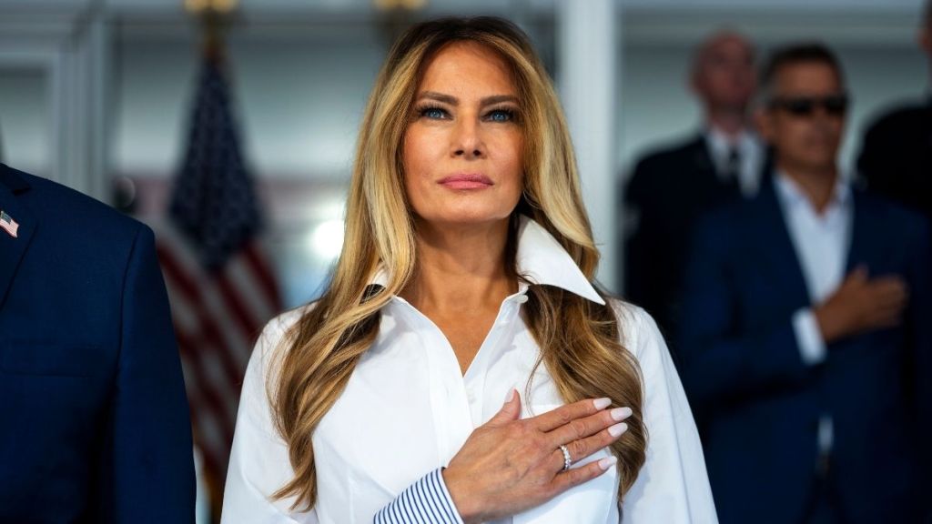 Melania Trump Leaves Her Crisp White Louis Vuitton Shirt Unbuttoned