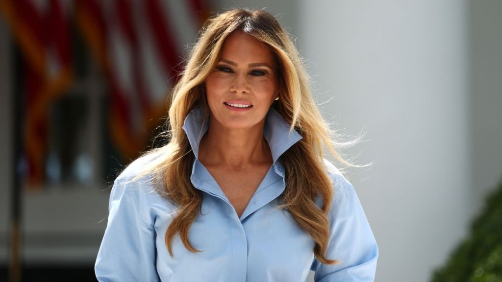 Melania Trump Leaves Michael Kors Shirt Unbuttoned Over Red-Hot Dior Skirt