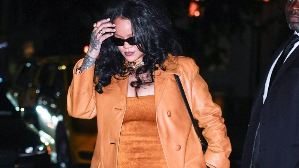 Rihanna Flaunts Curves & Bikini in COMME des GARCONS Dress With Big Cutouts